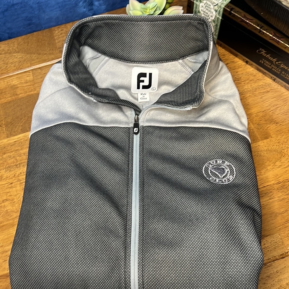 Woman’s FootJoy track jacket silver,and gray size large